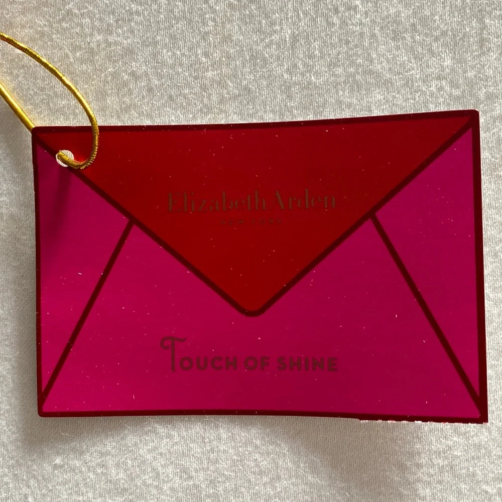 New Elizabeth Arden touch of shine set of three lip glosses